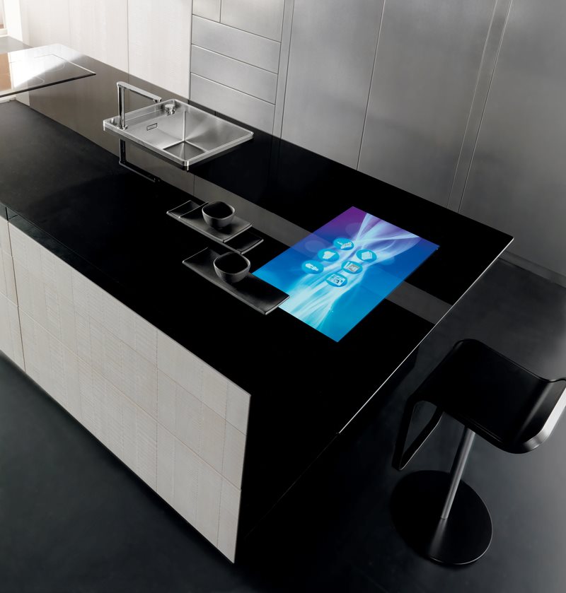 Сенсорная панель в черной столешнице на кухне в стиле хай-тек