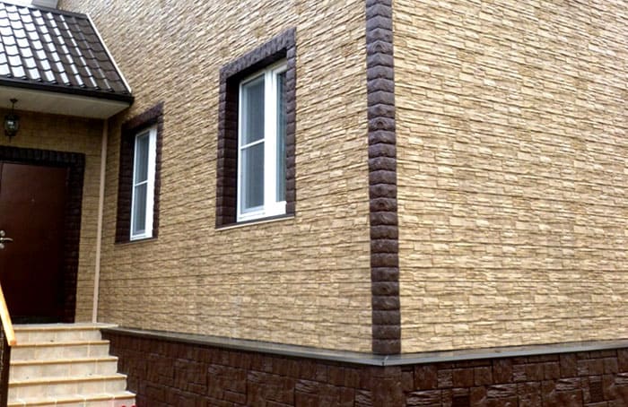 Отделка фасада здания с использованием цокольного и фасадного сайдинга Wandstein