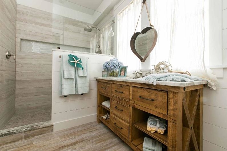 Ванная комната с душевой кабиной в морском стиле